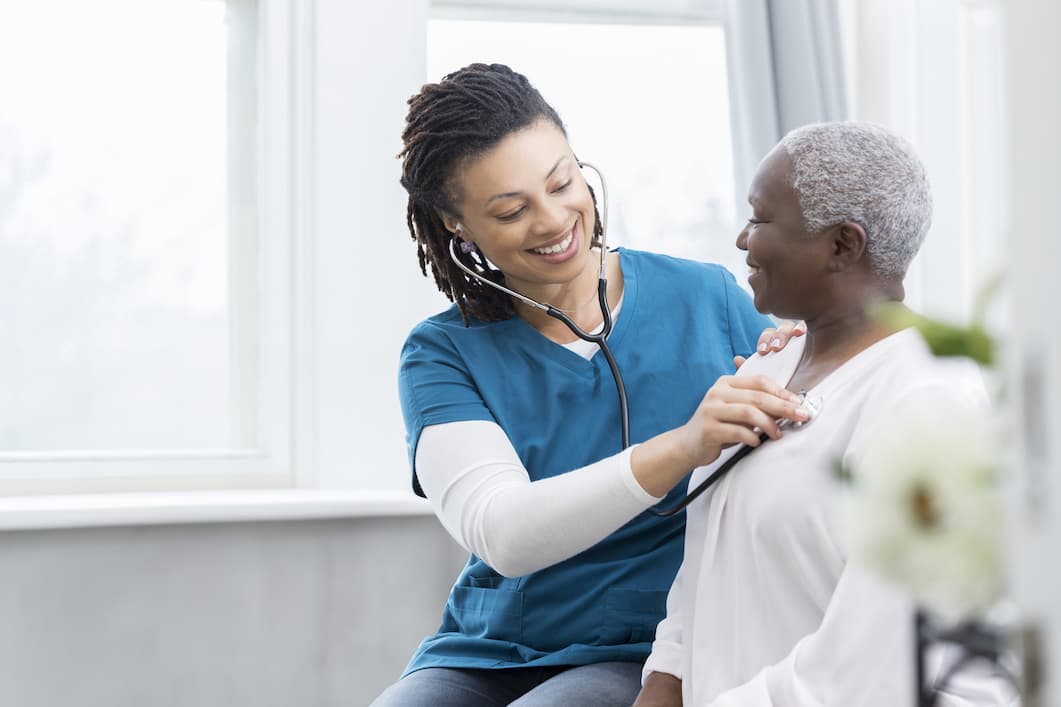 doctor listening to patient's chest